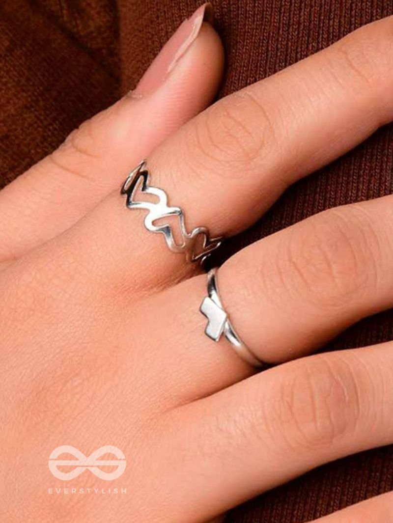 LOVE PUZZLE SET OF 2 SILVER RINGS