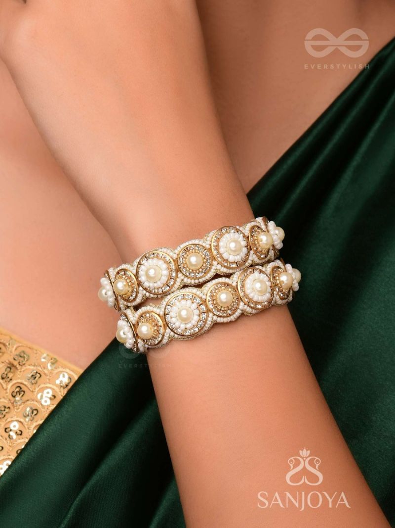 AYUDHA THE IVORY SHINE PEARLS AND BEADS EMBROIDERED BANGLES SET OF 2