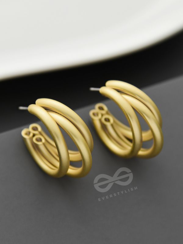 The Elegant Turns - Matte Finished Golden Hoops