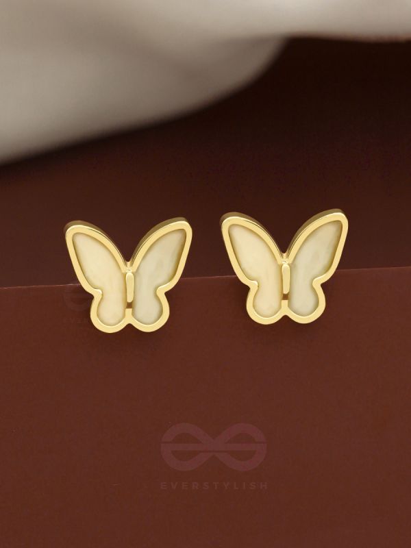 The Winged Wonder- White and Golden Earrings