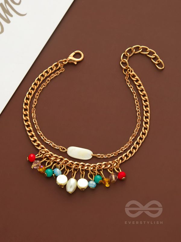 The Divine Galaxy- Pearls and Beads Studded Golden Bracelet