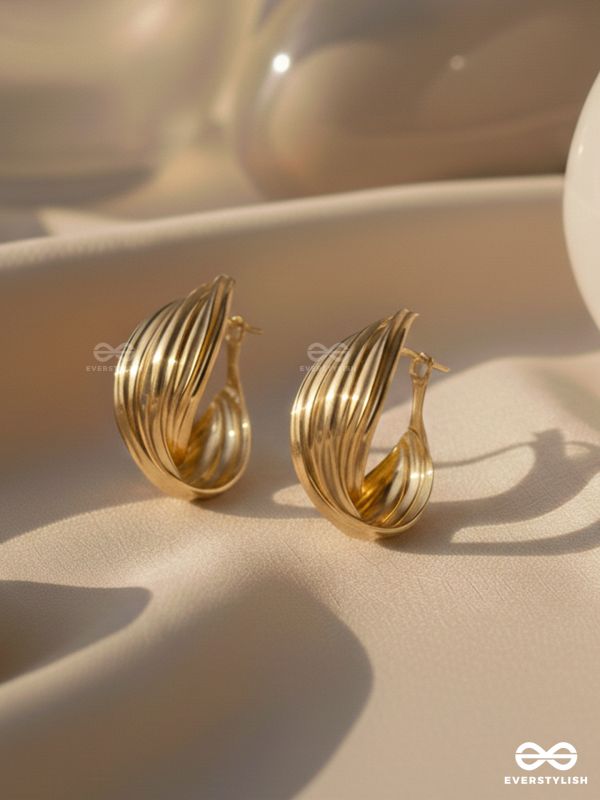 LEVELING IT UP - STATEMENT GOLDEN HOOPS