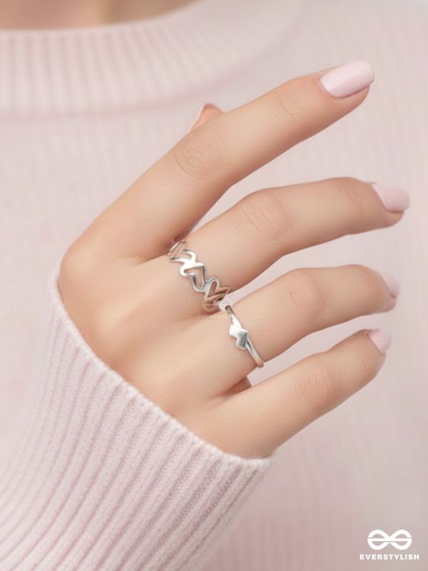 LOVE PUZZLE - SET OF 2 SILVER RINGS
