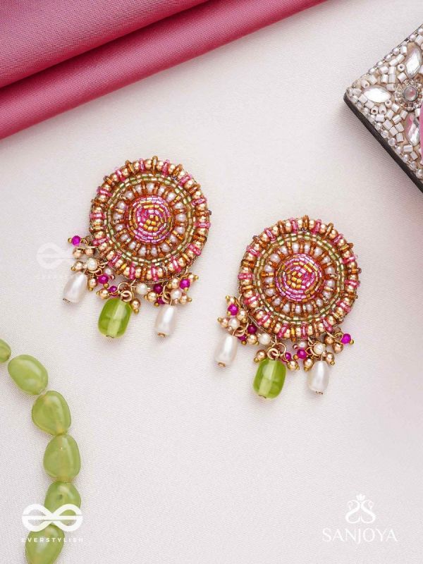 Māṇikyamāṇḍala- Gem Mandala-Circular motifs embellished with pink and golden accents, beads, and stones