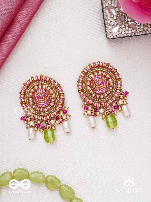 Māṇikyamāṇḍala- Gem Mandala-Circular motifs embellished with pink and golden accents, beads, and stones