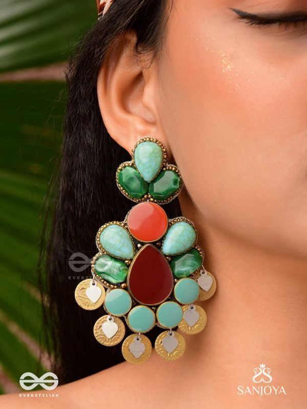Vikṛtiśīla- Elegant Form-Chunky blue, green, and rust-colored stones with a distinctive golden-silver leaflet design