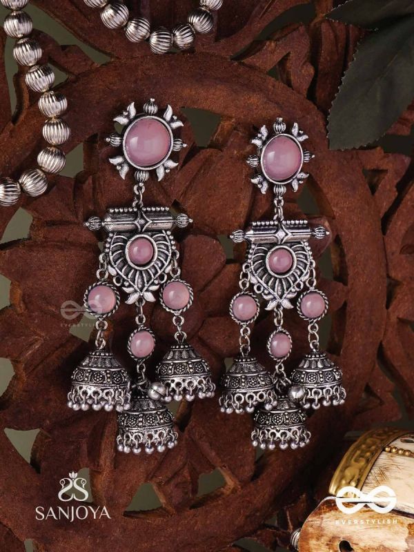 VIJAYAMUKTA-VICTORY PEARLS- REGAL OXIDIZED EARRINGS WITH A CENTRAL PURPLE STONE AND LAYERED JHUMKAS