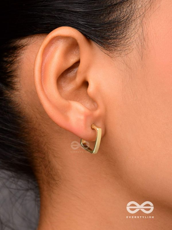 Golden glimmer- Golden colored rectangular  hoop earrings 