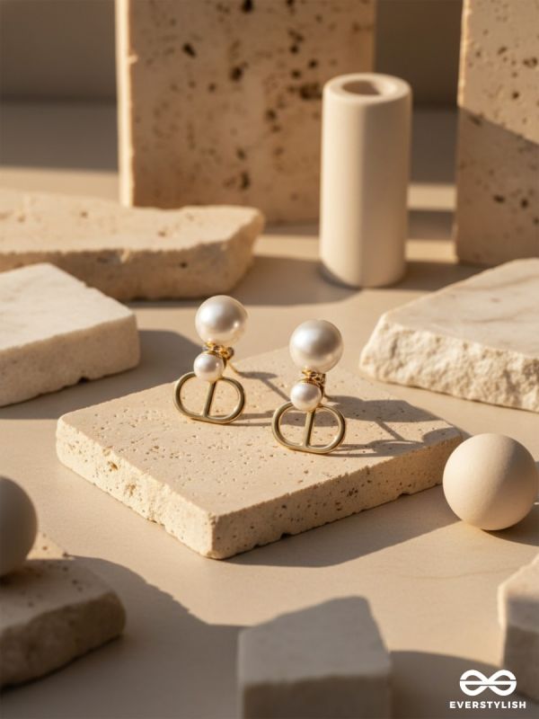 Starlit orb- dangling pearl earrings with golden spheres 