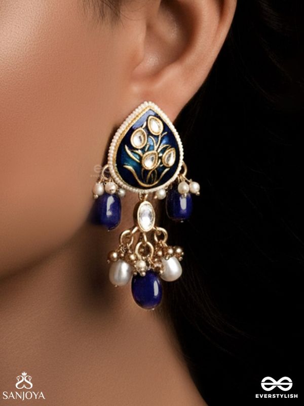 NILACHANDRIKA- MOONLIGHT OF THE BLUE SKY- KUNDAN EARRINGS WITH DEEP BLUE ENAMEL WORK WITH GOLDEN DETAILS, PEARLS, AND DAZZLING GEMS
