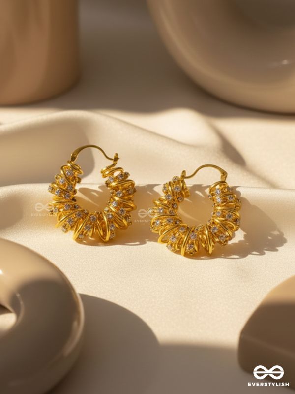 LUSTROUS SWIRLS-  INTRICATE TWISTED GOLD EARRINGS WITH SHIMMERING STONE