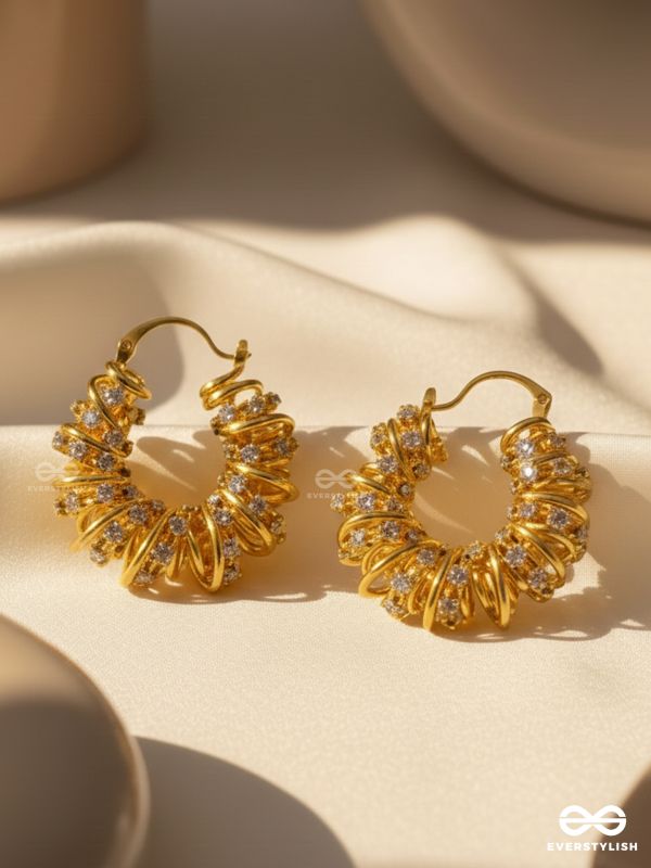 LUSTROUS SWIRLS-  INTRICATE TWISTED GOLD EARRINGS WITH SHIMMERING STONE