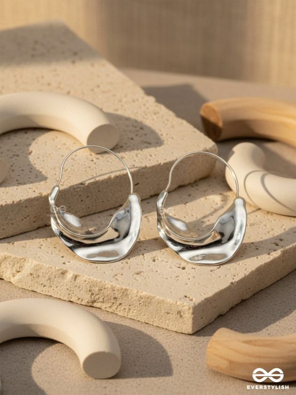 SILVER DRIFT- SCULPTED SILVER HOOPS WITH A FLUID