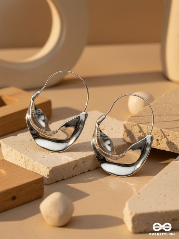 SILVER DRIFT- SCULPTED SILVER HOOPS WITH A FLUID