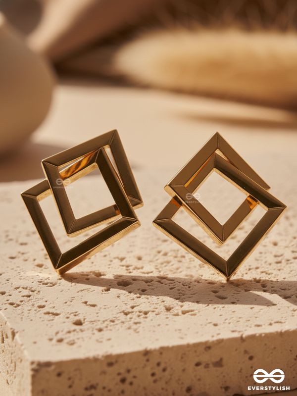 GOLDEN DIMENSION –  OPEN CUBE STATEMENT EARRINGS
