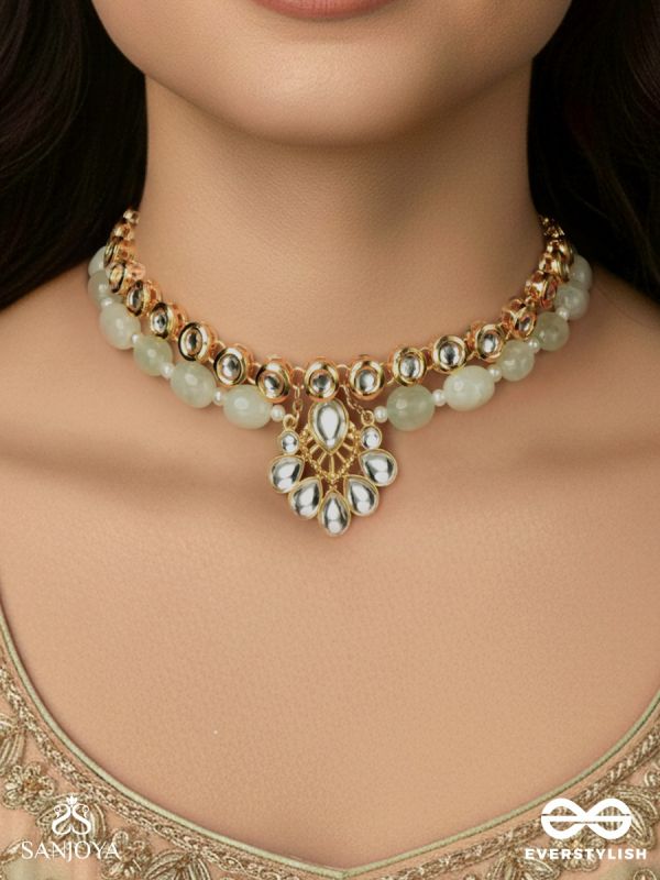 NAYANAMRITA – EYE PLEASING – PEARL-GREEN BEADED CHOKER NECKLACE WITH DAINTY KUNDAN LOTUS DROP