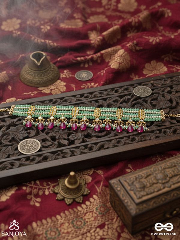 TAPANSHRI – BRIGHT RAY – GOLD CUTWORK MOTIF WITH REFLECTIVE STONES AND PINK BEAD CHOKER NECKLACE