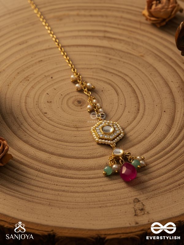 TAPANSHRI – BRIGHT RAY – GOLD CUTWORK MOTIF WITH REFLECTIVE STONES AND PINK BEAD MAANGTIKA