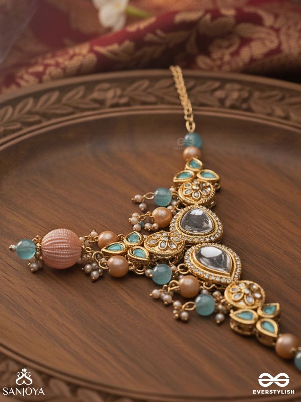 ANURANGI – HARMONY OF COLOURS – KUNDAN NECKLACE WITH GREEN ENAMEL MOTIFS, MIRROR STONES AND PASTEL BEAD DROPS