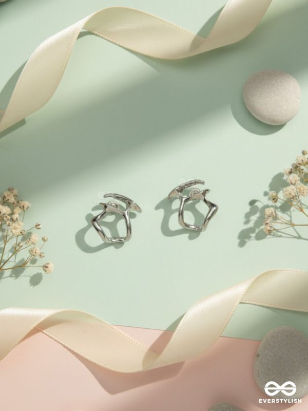 SOFT ANGLES – MODERN SILVER STUD EARRINGS