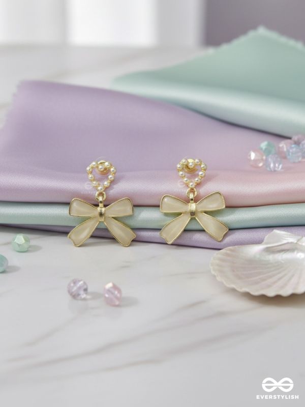 GOLDEN TIE – STATEMENT BOW EARRINGS