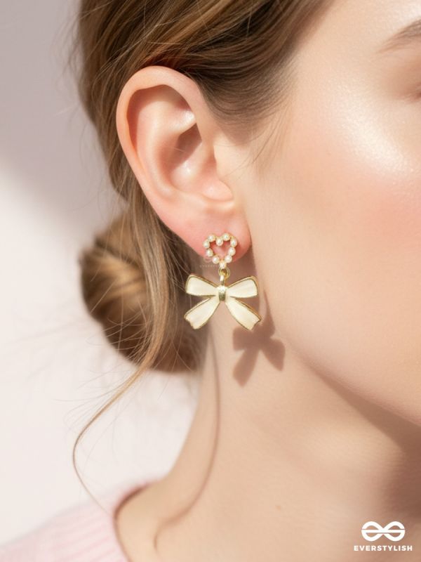 GOLDEN TIE – STATEMENT BOW EARRINGS