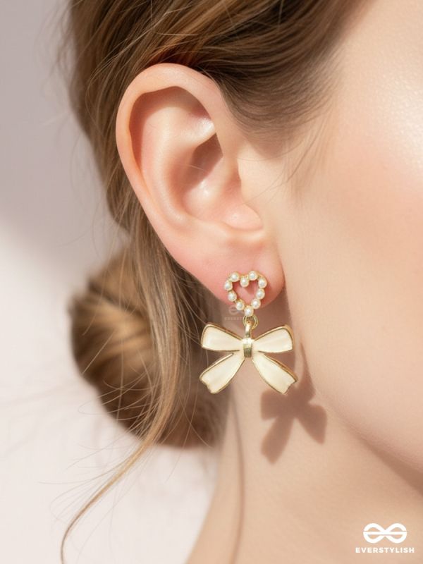 GOLDEN TIE – STATEMENT BOW EARRINGS
