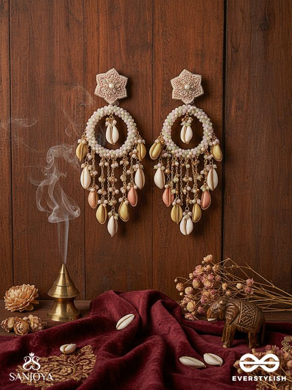 TARASAAGAR – CONSTELLATIONS MEET THE SEA – STAR-TOP EARRINGS WITH PEARL RIM AND PASTEL SHELL DROPS