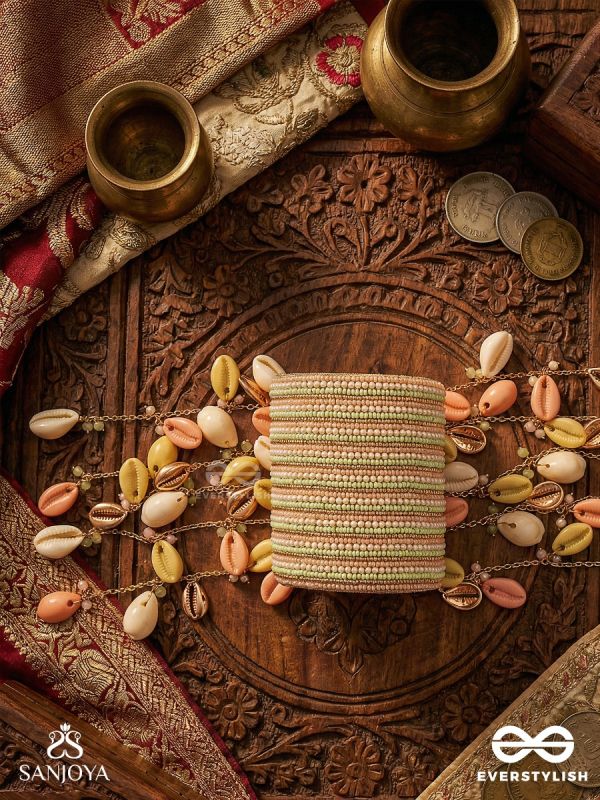 SAAGARIKA – DAUGHTER OF THE TIDES – TEXTURED CUFF WITH MULTI-STRAND PEARL DETAIL AND SUN-KISSED CHARM DROPS