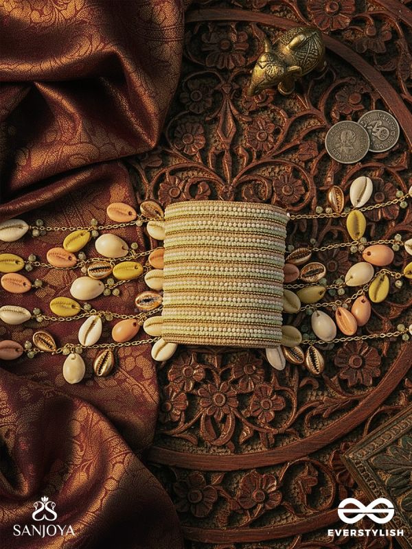 SAAGARIKA – DAUGHTER OF THE TIDES – TEXTURED CUFF WITH MULTI-STRAND PEARL DETAIL AND SUN-KISSED CHARM DROPS