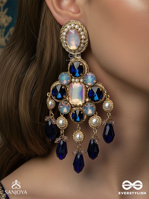 NEELRASHMI – RAY OF MIDNIGHT LIGHT – STATEMENT EARRINGS WITH SAPPHIRE-TONE STONES, BLUSH CENTRE DETAIL AND DRAMATIC DROP ACCENTS