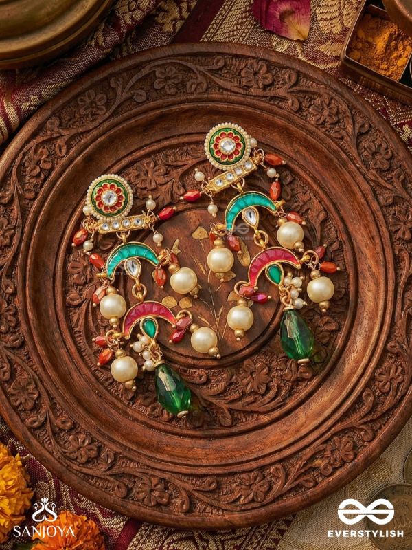 ISHVARIKA – CELESTIAL ORNAMENT – TURQUOISE AND CRIMSON CRESCENT EARRINGS WITH MEENAKARI MEDALLION AND PEARL-ACCENTED GEM DROPS