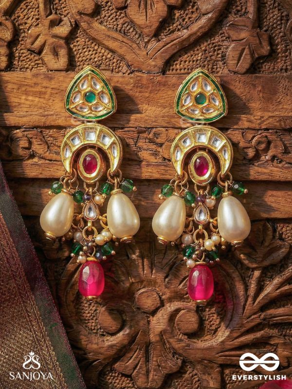 SHIVANSHI – DIVINE TRACE – KUNDAN ARC EARRINGS WITH CRIMSON OVAL CENTRE, PEARL DROPS AND GREEN BEAD ACCENTS