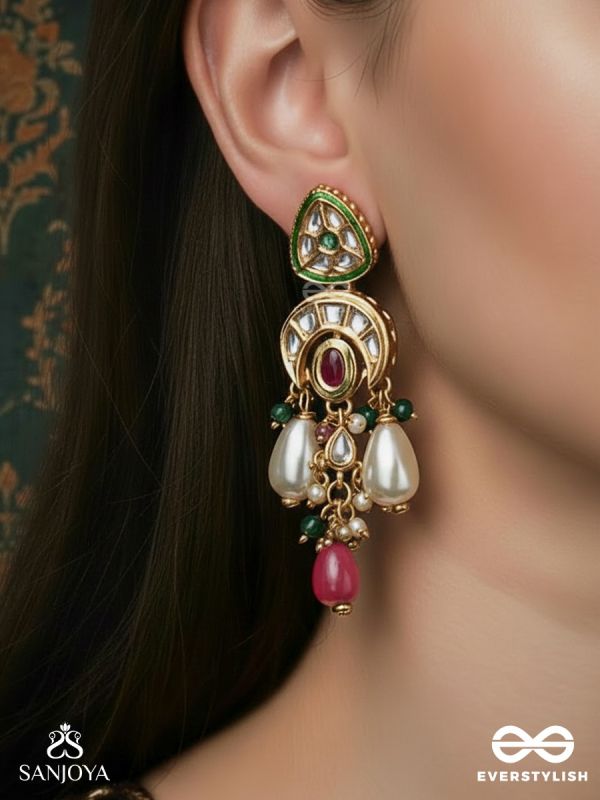 SHIVANSHI – DIVINE TRACE – KUNDAN ARC EARRINGS WITH CRIMSON OVAL CENTRE, PEARL DROPS AND GREEN BEAD ACCENTS