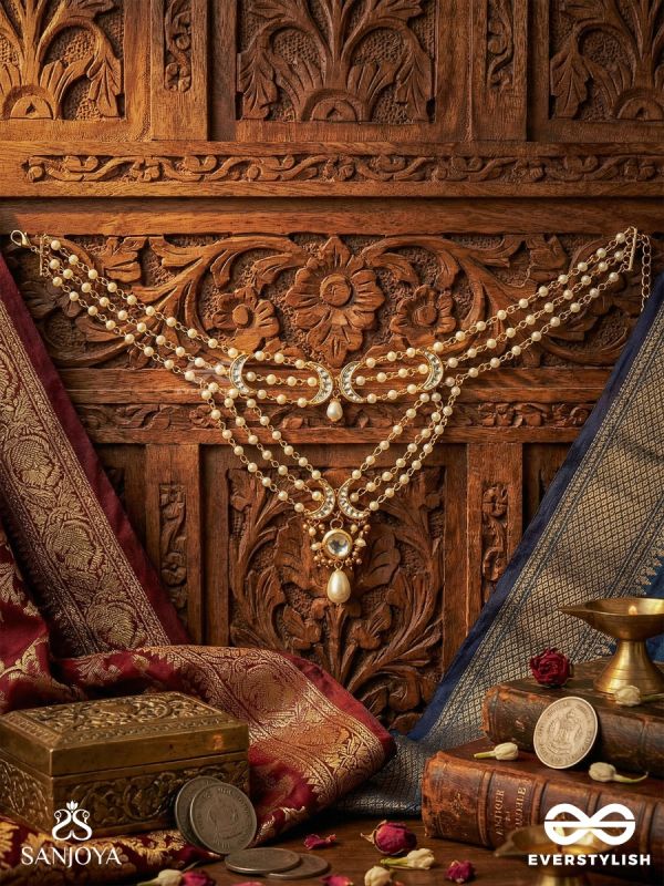 NISHITHA – NIGHT BLOOM – LAYERED PEARL NECKPIECE WITH ORNAMENTED CONNECTORS AND MIRROR-CENTRED PENDANT DROP