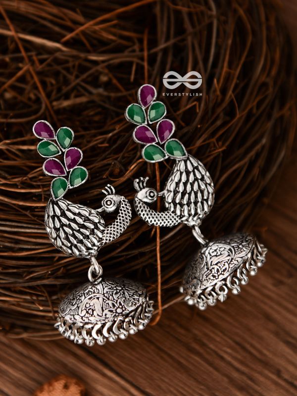 The Dancing Peacocks Engraved Jhumkis (Ruby Emerald) - Embellished Oxidised Collection