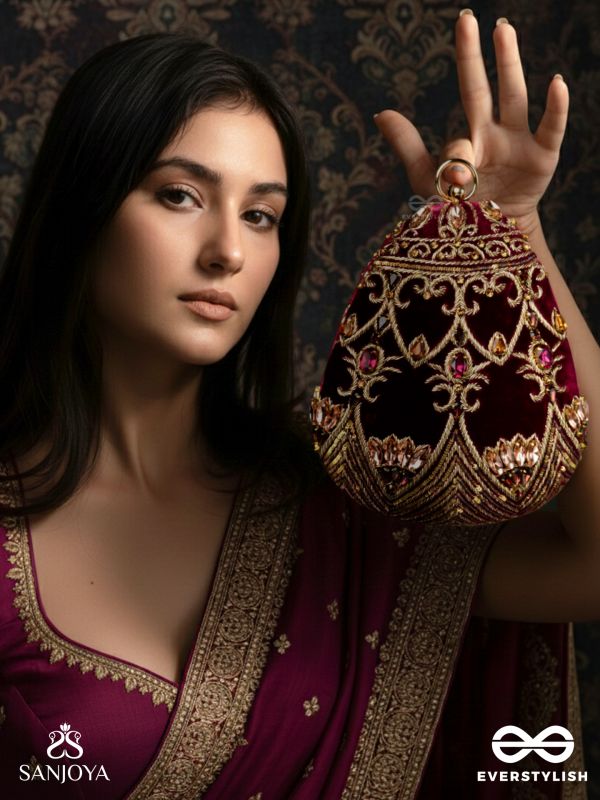 ZEENAT – OVAL DARK PINK VELVET CLUTCH WITH DETAILED EMBELLISHMENT AND GOLDEN METAL FRAME