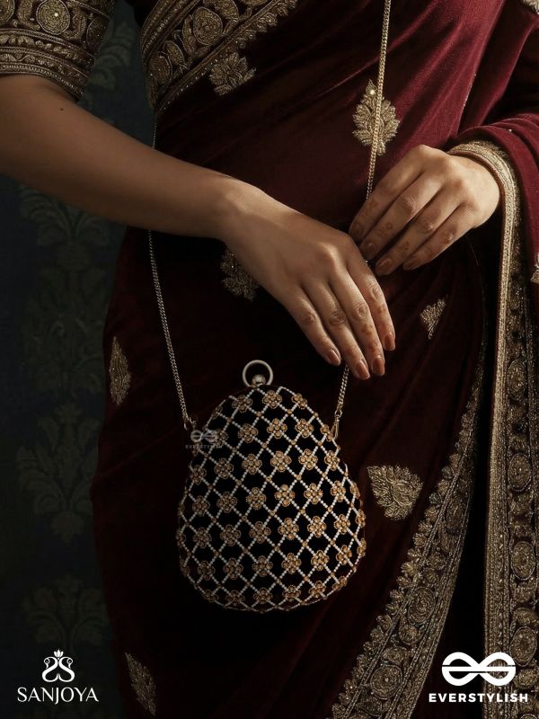 SHAHNAZ – OVAL MAROON VELVET CLUTCH WITH INTRICATE ZARDOZI EMBROIDERY AND GOLDEN METAL FRAME
