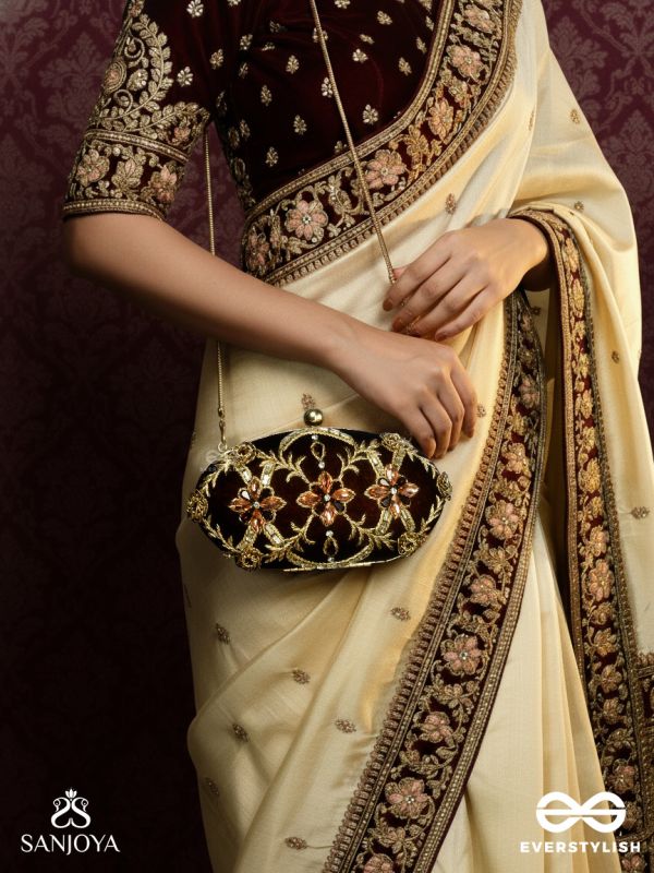 ROHINI – POLISHED BRONZE BROWN TEXTILE CLUTCH WITH FACETED JEWEL ACCENTS AND GOLDEN METAL FRAME
