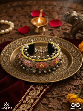 SUMANALEKHA-FLORAL PATTERN- SEMI-OXIDIZED BRACELET FEATURES GHUNGROO, BEADS, AND EMBROIDERED FLOWERS