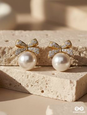 BOW IN SNOW- WHITE PEARL BOW EARRINGS