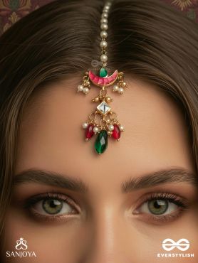 YASHASVINI – GLORIOUS BEAUTY – TRADITIONAL ARC MAANGTIKA WITH COLOURFUL GEM ACCENTS