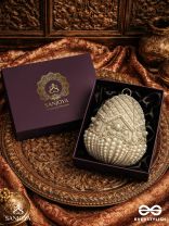 SAHIBA  – OVAL IVORY SILK CLUTCH WITH PEARL EMBEDDING AND GOLDEN METAL FRAME