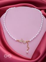 TWO TINY AVIATORS - GOLDEN PEARL NECKPIECE