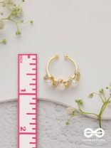 The Twisted Elegance - Cubic Zirconia Golden Ring (Adjustable)