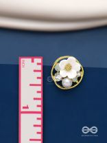 Divine temptation- white floral studs encircled with golden mesh 