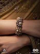 SHYAMALIKA – DARK BLOOM A FLORAL-INSPIRED BRACELET ADORNED WITH DARK-HUED GEMSTONES AND PEARLS