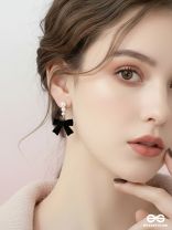 MIDNIGHT BOW - CHIC BLACK BOW WITH PEARL ACCENTS