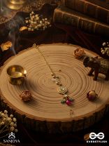 TAPANSHRI – BRIGHT RAY – GOLD CUTWORK MOTIF WITH REFLECTIVE STONES AND PINK BEAD MAANGTIKA