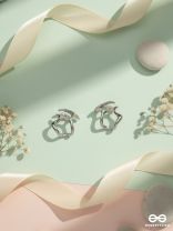 SOFT ANGLES – MODERN SILVER STUD EARRINGS